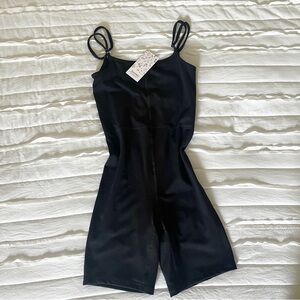 Black romper with tags